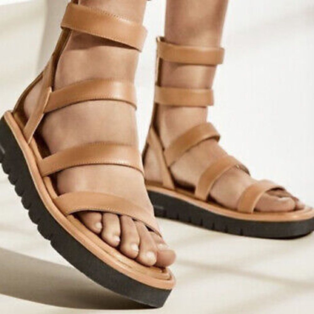 Stuart Weitzman Gala Lift Sandal in Tan.